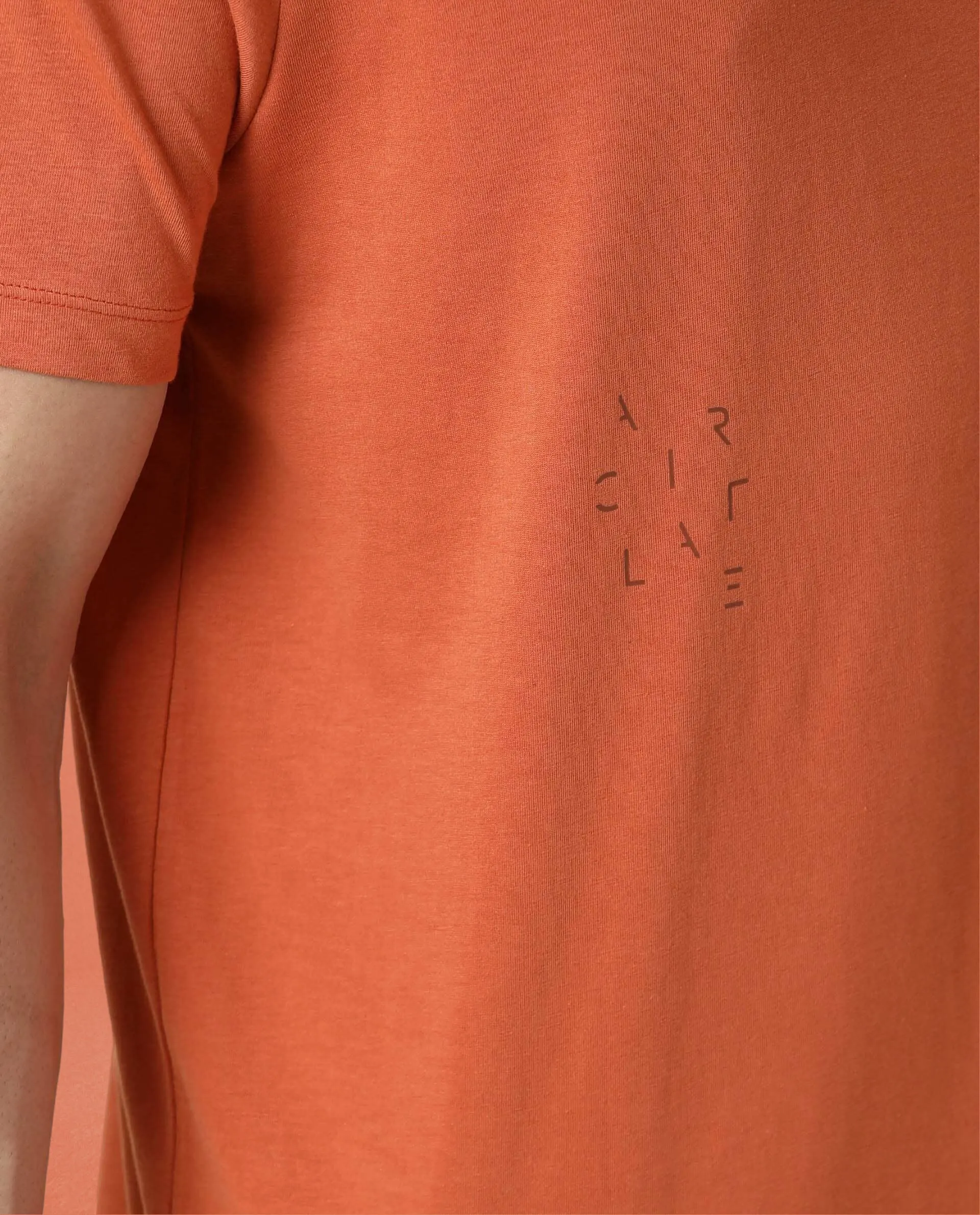 Rare Rabbit Articale Men's Caxel Tangy Orange Crew Neck Offset Brand Print Half Sleeves T-shirt