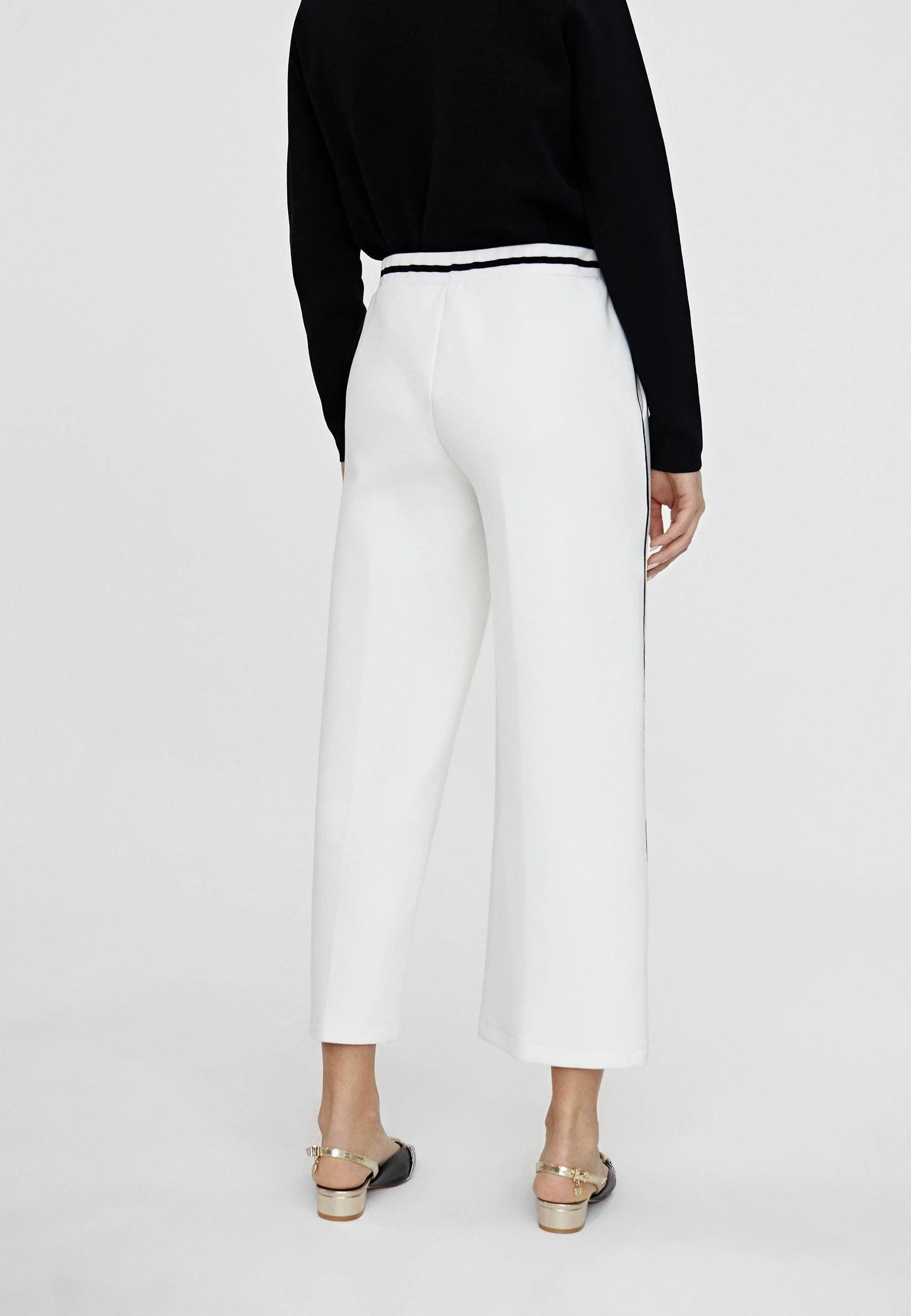 Tracksuit bottoms with piping