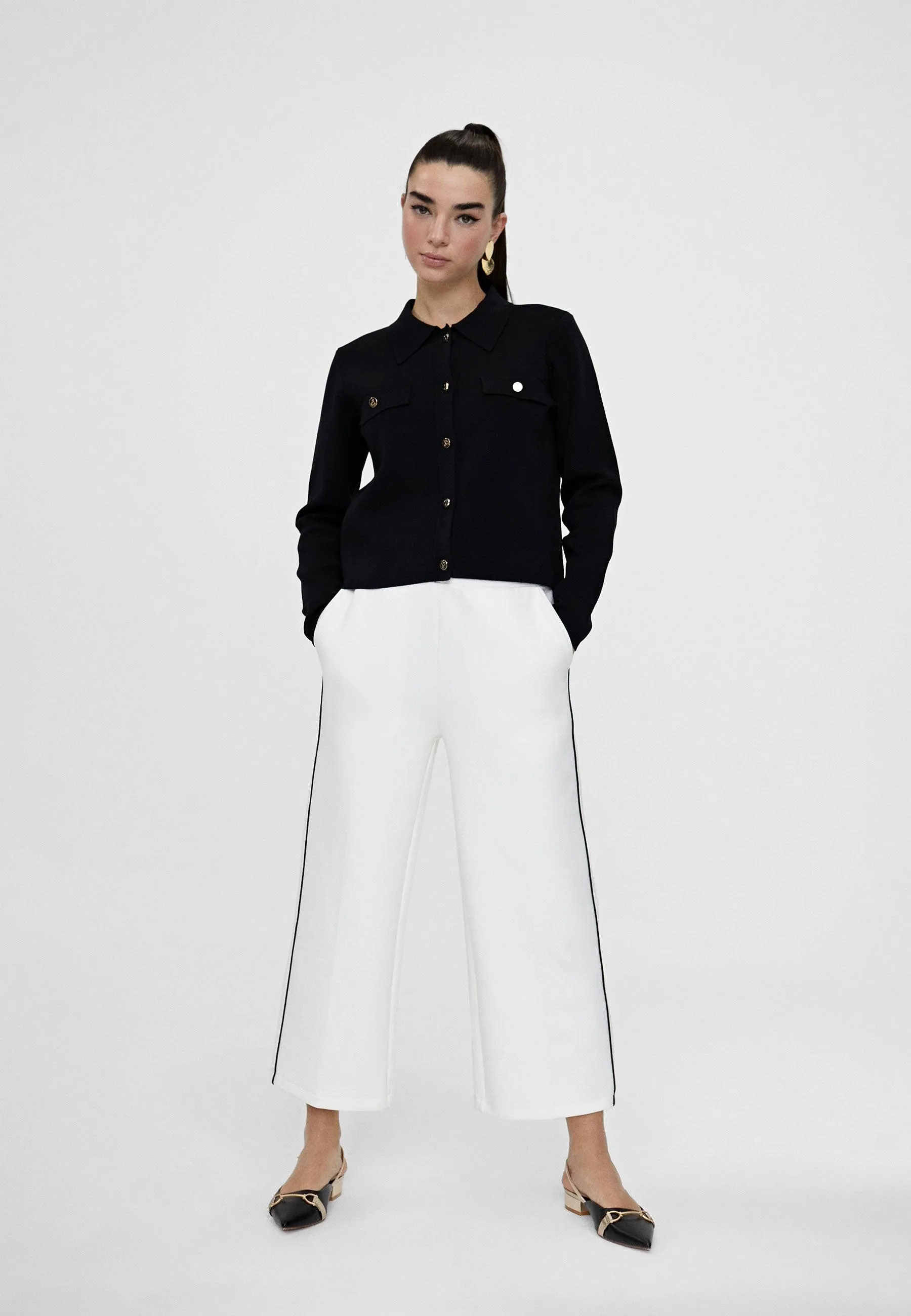 Tracksuit bottoms with piping